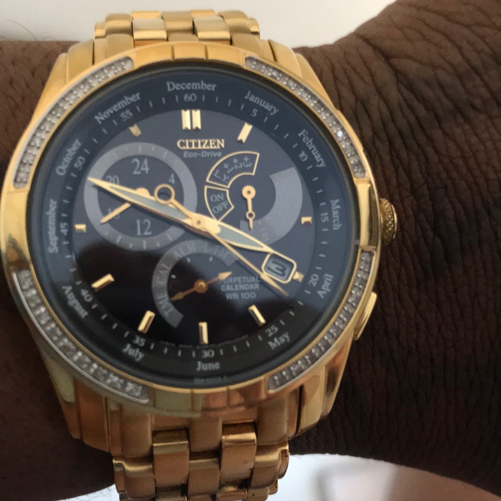 Gold Citizens Eco Drive With V1 In It